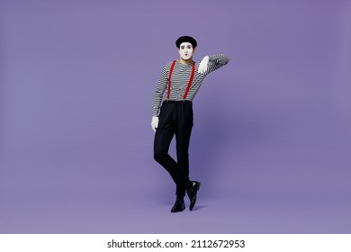 Full Size Body Length Confident Young Mime Man With White Face Mask Wears Striped Shirt Beret Look Camera Lean On Something Invisible Isolated On Plain Pastel Light Violet Background Studio Portrait