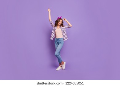 Full size body length portrait of nice cheerful cheery positive playful girlish lovely attractive slim fit lady closed eyes having fun checkered shirt isolated over violet pastel background