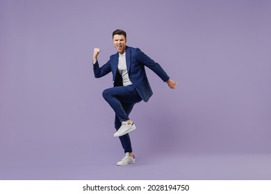 Full Size Body Length Young Successful Employee Business Man Lawyer 20s Wear Formal Blue Suit White T-shirt Work In Office Do Winner Gesture Celebrate Isolated Pastel Purple Background Studio Portrait