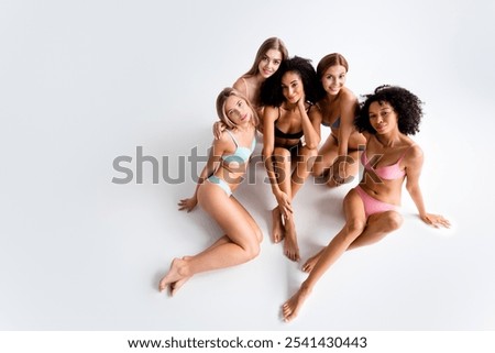 Full size high angle view portrait of five pretty genuine model girls empty space wear bikini studio background