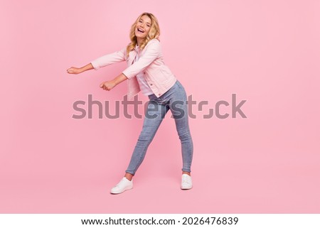 Full size photo of carefree satisfied person toothy smile enjoy free time isolated on pastel pink color background