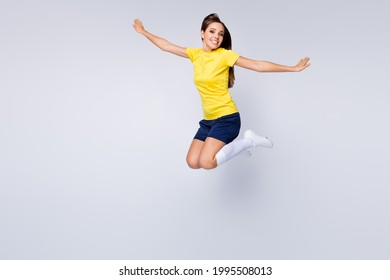 Full Size Photo Of Cheerful Professional Soccer Player Girl Jump Enjoy Play Football World Championship Cup Wear Kit White Socks Shoes Boots Isolated Over Grey Color Background