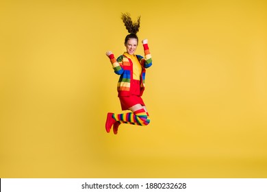 Full Size Photo Crazy Funky Teen Girl Jump Raise Fists Scream Wear Rainbow Skirt Long Socks Isolated Shine Color Background