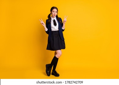 Full size photo of dream dreamy high school girl have university class day make v-sign send air kiss wear good look uniform shoes isolated over bright shine color background