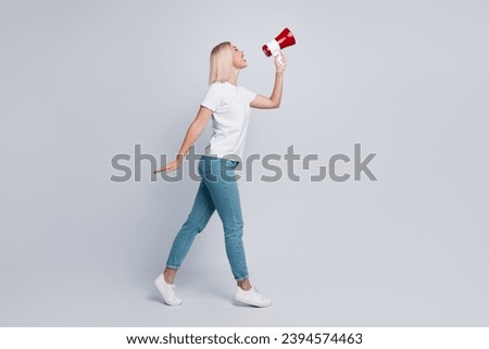 Full size photo of elegant girlish woman dressed white t-shirt scream in loudspeaker look empty space isolated on white color background