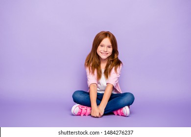 Full size photo of foxy little lady sitting floor friendly smiling wear casual clothes isolated purple background - Powered by Shutterstock