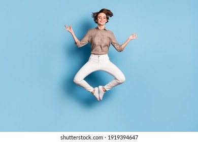 Full Size Photo Of Pretty Calm Woman Jump Up Air Make Om Sign Relax Isolated On Pastel Blue Color Background