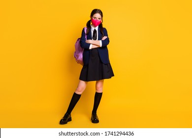 Full Size Photo Of Smart High School A-level Student Girl Cross Hands Wear Blazer Skirt Shoes Medical Mask Isolated Over Bright Shine Color Background