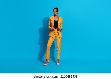 Full size photo of young cheerful girl guy wear modern look leader executive isolated over blue color background - Powered by Shutterstock