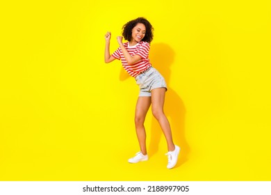 Full Size Photo Of Young Dancing Funny Woman After Work Chill Vacation Dance Club Isolated On Yellow Color Background