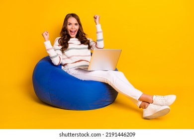 Full Size Photo Of Young Pretty Nice Perfect Girl Sitting Using Laptop Got Instagram Likes From Boyfriend Celebrate Isolated On Yellow Color Background