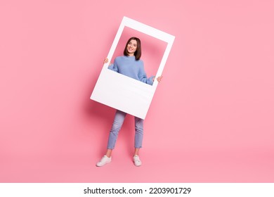 Full Size Photo Of Young Pretty Positive Girl Take Shoot Party Holding White Photo Frame Isolated On Pink Color Background