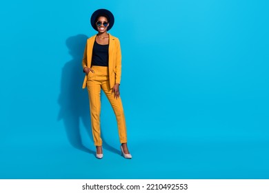 Full Size Portrait Of Charming Confident Person Arm Pocket Wear Stilettos Isolated On Blue Color Background