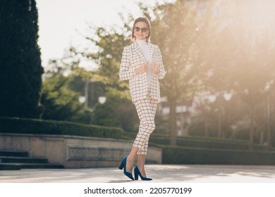 Full Size Portrait Of Luxury Gorgeous Lady Posing Arms Adjust Blazer Warm Sunny Weather Outside