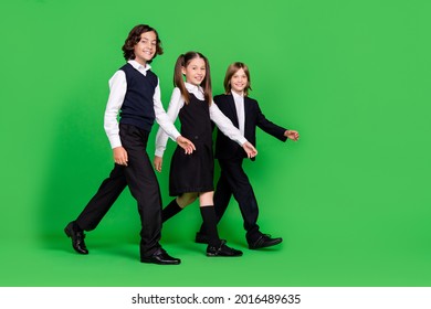 Full Size Profile Photo Of Nice Little Girl Boys Go Wear School Uniform Isolated On Green Background