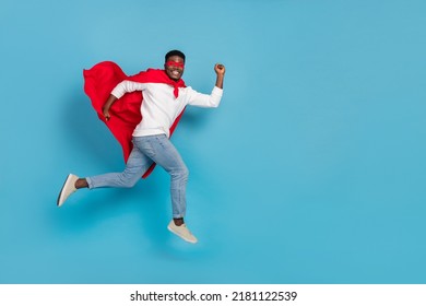 Full size profile portrait of energetic active person run hurry isolated on blue color background