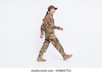 Full size profile portrait of satisfied lady walking look empty space isolated on white color background - Powered by Shutterstock