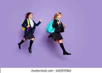 Full Size Profile Side Photo Sweet Kids Run Late Elementary School Wear Skirt Long Socks Stylish Trendy Isolated Over Purple Violet Background