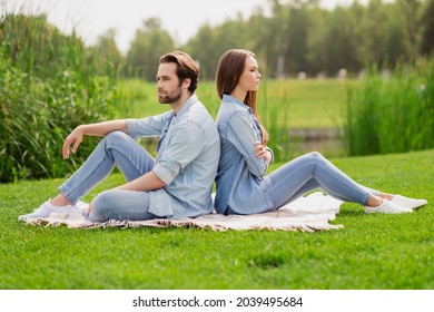 Full size profile side photo of young unhappy angry couple have problem misunderstanding sit back to back conflict quarrel