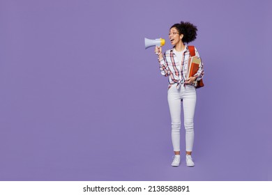 Full Size Young Girl Woman Of African American Ethnicity Teen Student In Shirt Hold Scream Megaphone Announces Discounts Sale Hurry Up Isolated On Plain Purple Background. Education In College Concept