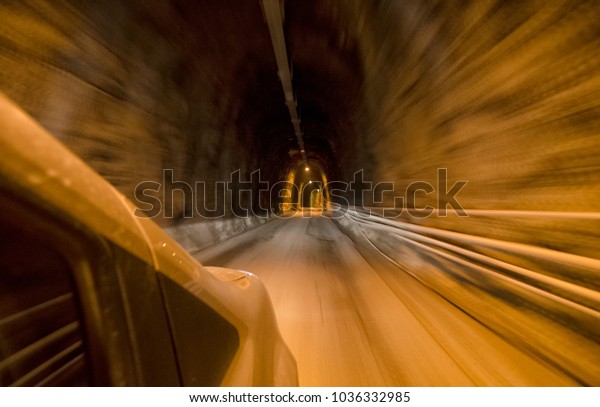 At full speed inside a\
carved tunnel