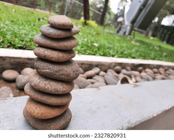 full stack balance stone in the garden
