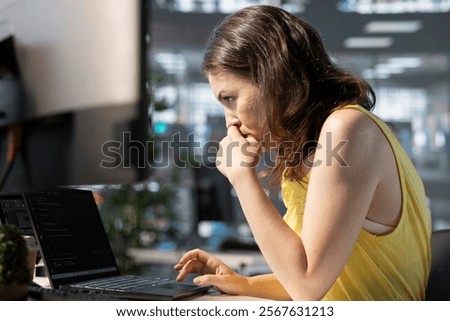Full stack developer using laptop to create machine learning models that can process and analyze data to automate decision making processes. IT professional programming in office using notebook