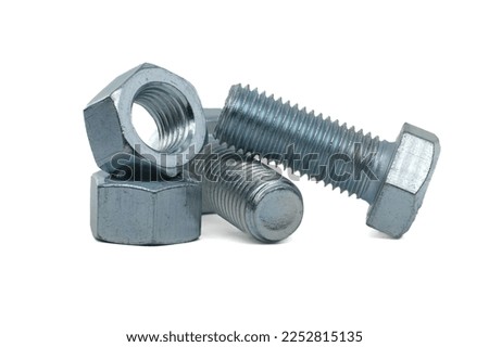 Full thread hexagon bolts and internal screws coated with a protective layer of zinc isolated on white background