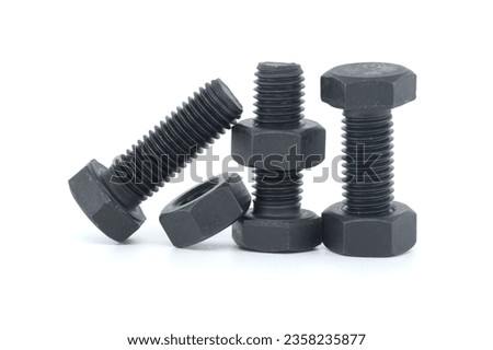 Full thread hexagon bolts and internal screws coated with black oxide isolated on white background