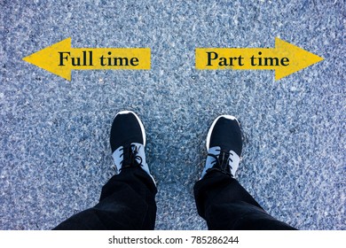 Full Time Vs Part Time Direction Sign Text On Asphalt Ground