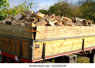 Full Tractor Trailer Of Firewood Chopped On Logs, Logging For Winter, Concept Stoking Stove, Fireplace, Seasonal Cooling In Housing, Economic Problems In Energy Sector, Shutdown Of Russian Gas