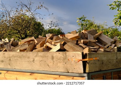 Full Tractor Trailer Of Firewood Chopped On Logs, Logging For Winter, Concept Stoking Stove, Fireplace, Seasonal Cooling In Housing, Economic Problems In Energy Sector, Shutdown Of Russian Gas