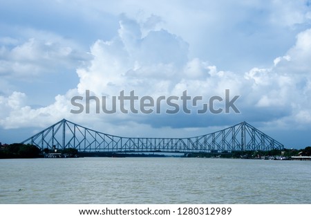 Full view of Howrah bridge in cloudy day. Howrah bridge is a cantilever bridge on Hooghly river, Kolkata.