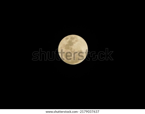 A full view of the Super moon, also known as the\
Buck Moon on the 13th of July 2022 at 8pm. The photo was taken in\
Gauteng, South Africa