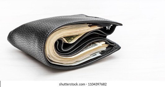 full-wallet-money-on-white-260nw-1104397682.jpg