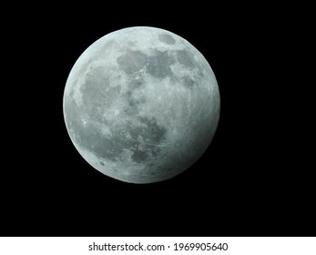 Full Wolf Moon And Partial Lunar Eclipse