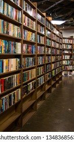 Fullerton, CA / United States - March 24 2019: An Aisle Of Books In A Used Book Store.