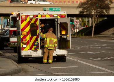 Fullerton, California / USA - March 19, 2020: Emergency Medical Personnel  Respond To The Scene Of An Emergency.