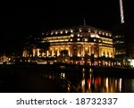 Fullerton hotel at night in Singapore