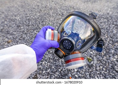 Full-Face Respirator protective gas mask  close up against virus, radiation, bacteria and dust. Professional mask shortage during Covid-19 Coronavirus SARS-CoV-2 pandemic worldwide outbreak.