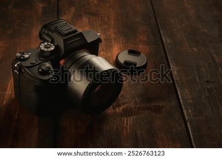 fullframe sensor mirrorless camera in wood background 