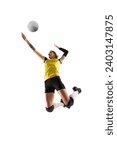 Full-length image of young athletic woman, volleyball player in motion, playing and hitting ball isolated over white background. Concept of sport, competition, active and healthy lifestyle, hobby