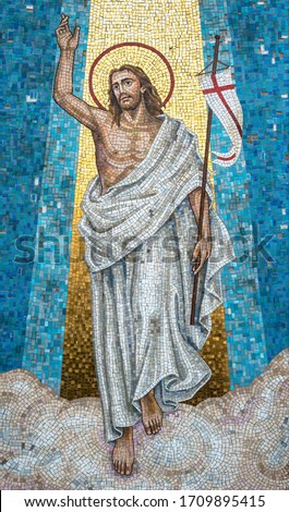 Full-length jesus mosaic with arms in prayer position. The painting is full of colors. It can be used for backgrounds, concepts and holidays.