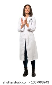 A Full-length Shot Of A Young Doctor Woman Applauding After Presentation In A Conference Over Isolated White Background