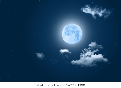 Fullmoon in night sky filtered blue tone with clouds for background