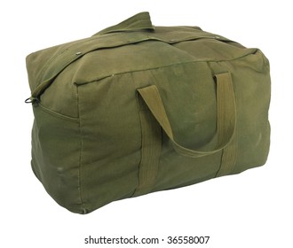 Fully Loaded Army Style Green Canvas Duffel Bag, Fabric Is Scratched, Stained And Faded, Isolated On White