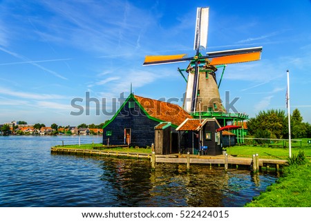 Fully Operational Historic Dutch Windmill in Zaanse Schans on the Zaan River in the Netherlands