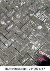 Fun activity to do. Drawing anything on the pavings.