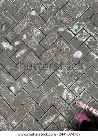 Fun activity to do. Drawing anything on the pavings.