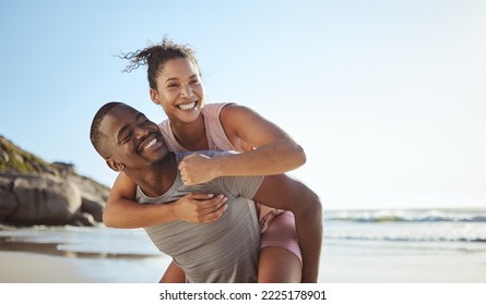 Fun, black couple and piggyback with happy people on vacation playing and being silly while having fun. Holiday, getaway and african girlfriend and boyfriend play whole being carefree by the sea - Shutterstock ID 2225178901